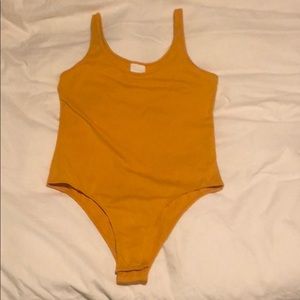 Mustard body suit